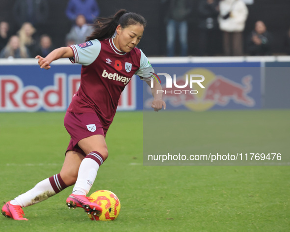 Lime Mengwen, on loan from Brighton & Hove Albion, of West Ham United WFC plays during the Barclays FA Women's Super League soccer match bet...