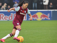 Lime Mengwen, on loan from Brighton & Hove Albion, of West Ham United WFC plays during the Barclays FA Women's Super League soccer match bet...