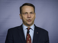 Poland's Minister of Foreign Affairs, Radoslaw Sikorski, speaks as he participates in a press conference in Warsaw, Poland, on November 12,...