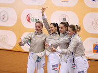 The Hungary Women's Saborie Team reacts after winning first place during the 2024 Fencing World Cup in Oran, Algeria, on November 10, 2024 (