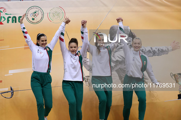 The Hungary Women's Saborie Team reacts after winning first place during the 2024 Fencing World Cup in Oran, Algeria, on November 10, 2024 