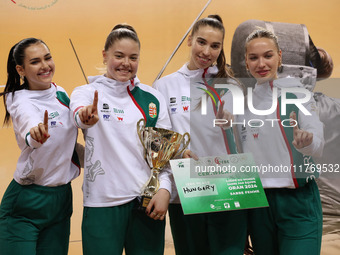 The Hungary Women's Saborie Team reacts after winning first place during the 2024 Fencing World Cup in Oran, Algeria, on November 10, 2024 (