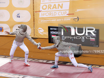 Hungarian Spiesz Anna (left) faces Polish Lenkiewicz Zuzanna (right) during the female saber team final at the 2024 Fencing World Cup in Ora...