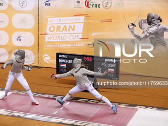 Hungarian Spiesz Anna (left) faces Polish Lenkiewicz Zuzanna (right) during the female saber team final at the 2024 Fencing World Cup in Ora...