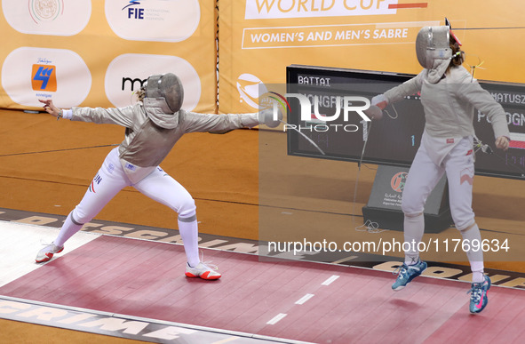 Hungarian Spiesz Anna (left) faces Polish Lenkiewicz Zuzanna (right) during the female saber team final at the 2024 Fencing World Cup in Ora...