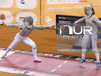 Hungarian Spiesz Anna (left) faces Polish Lenkiewicz Zuzanna (right) during the female saber team final at the 2024 Fencing World Cup in Ora...