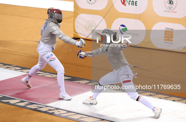 Hungarian Spiesz Anna (left) faces Polish Lenkiewicz Zuzanna (right) during the female saber team final at the 2024 Fencing World Cup in Ora...