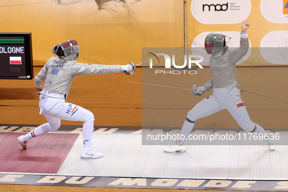 Hungarian Spiesz Anna (left) faces Polish Lenkiewicz Zuzanna (right) during the female saber team final at the 2024 Fencing World Cup in Ora...