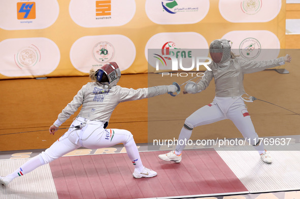 Hungarian Spiesz Anna (left) faces Polish Lenkiewicz Zuzanna (right) during the female saber team final at the 2024 Fencing World Cup in Ora...