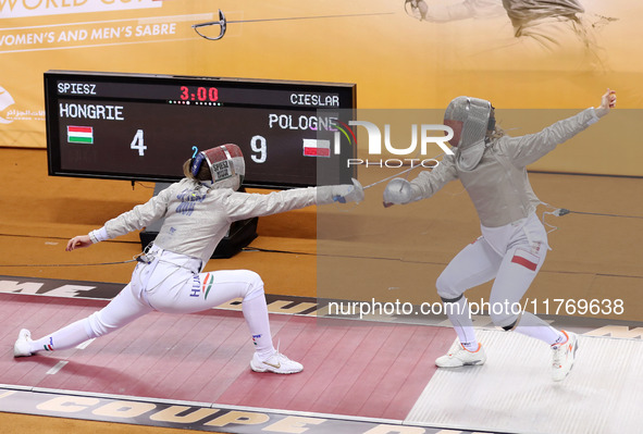 Hungarian Spiesz Anna (left) faces Polish Lenkiewicz Zuzanna (right) during the female saber team final at the 2024 Fencing World Cup in Ora...