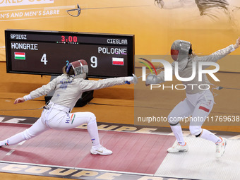 Hungarian Spiesz Anna (left) faces Polish Lenkiewicz Zuzanna (right) during the female saber team final at the 2024 Fencing World Cup in Ora...