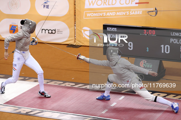 Hungarian Spiesz Anna (left) faces Polish Lenkiewicz Zuzanna (right) during the female saber team final at the 2024 Fencing World Cup in Ora...