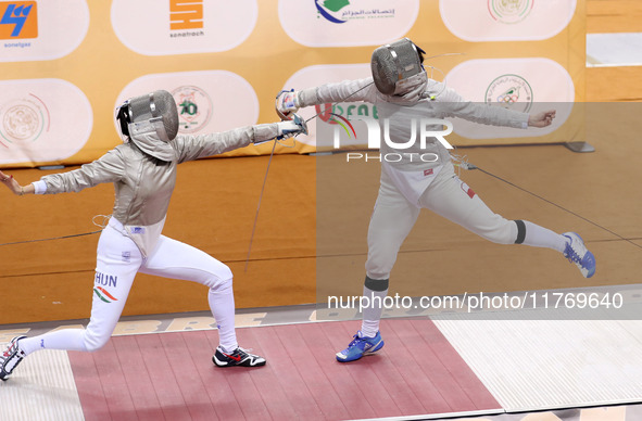 Hungarian Spiesz Anna (left) faces Polish Lenkiewicz Zuzanna (right) during the female saber team final at the 2024 Fencing World Cup in Ora...