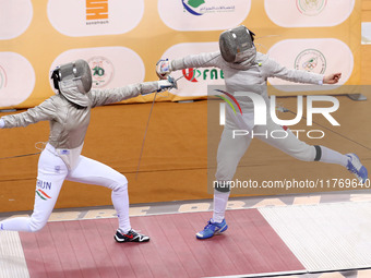 Hungarian Spiesz Anna (left) faces Polish Lenkiewicz Zuzanna (right) during the female saber team final at the 2024 Fencing World Cup in Ora...