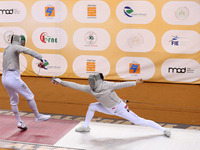 Iranian Baher Arasbaran Farzad (left) confronts Ha Hansol of South Korea (right) during the final of the Male Saber Team event at the 2024 F...