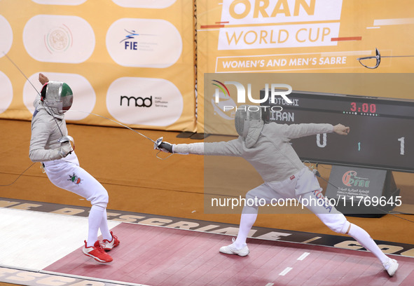 Iranian Baher Arasbaran Farzad (left) confronts Ha Hansol of South Korea (right) during the final of the Male Saber Team event at the 2024 F...