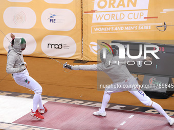 Iranian Baher Arasbaran Farzad (left) confronts Ha Hansol of South Korea (right) during the final of the Male Saber Team event at the 2024 F...