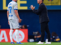 Luis Garcia Plaza, head coach of Deportivo Alaves, talks to Kike Garcia of Deportivo Alaves during the LaLiga EA Sports match between Villar...