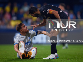 Raul Albiol of Villarreal CF talks with Toni Martinez of Deportivo Alaves during the LaLiga EA Sports match between Villarreal CF and Deport...