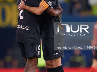 Raul Albiol of Villarreal CF embraces his teammate Logan Evans Costa of Villarreal CF following the LaLiga EA Sports match between Villarrea...