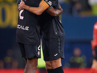 Raul Albiol of Villarreal CF embraces his teammate Logan Evans Costa of Villarreal CF following the LaLiga EA Sports match between Villarrea...