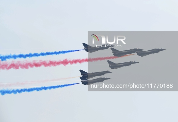 The ''August 1'' aerobatic team of the Chinese Air Force flies a J-10C during a demonstration at the 2024 Zhuhai Air Show in Zhuhai, China,...