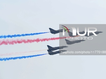 The ''August 1'' aerobatic team of the Chinese Air Force flies a J-10C during a demonstration at the 2024 Zhuhai Air Show in Zhuhai, China,...