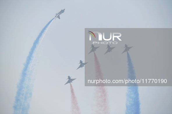 The ''August 1'' aerobatic team of the Chinese Air Force flies a J-10C during a demonstration at the 2024 Zhuhai Air Show in Zhuhai, China,...