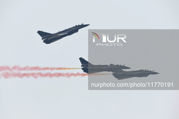 The ''August 1'' aerobatic team of the Chinese Air Force flies a J-10C during a demonstration at the 2024 Zhuhai Air Show in Zhuhai, China,...