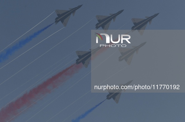 The ''August 1'' aerobatic team of the Chinese Air Force flies a J-10C during a demonstration at the 2024 Zhuhai Air Show in Zhuhai, China,...