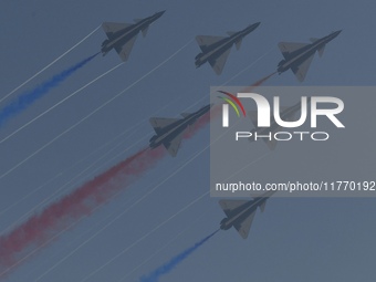 The ''August 1'' aerobatic team of the Chinese Air Force flies a J-10C during a demonstration at the 2024 Zhuhai Air Show in Zhuhai, China,...