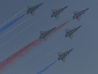 The ''August 1'' aerobatic team of the Chinese Air Force flies a J-10C during a demonstration at the 2024 Zhuhai Air Show in Zhuhai, China,...