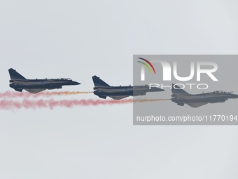 The ''August 1'' aerobatic team of the Chinese Air Force flies a J-10C during a demonstration at the 2024 Zhuhai Air Show in Zhuhai, China,...