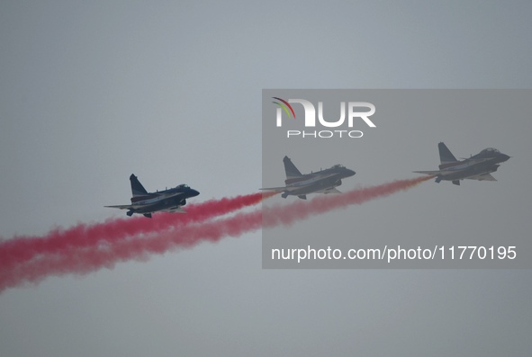 The ''August 1'' aerobatic team of the Chinese Air Force flies a J-10C during a demonstration at the 2024 Zhuhai Air Show in Zhuhai, China,...