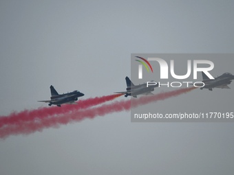 The ''August 1'' aerobatic team of the Chinese Air Force flies a J-10C during a demonstration at the 2024 Zhuhai Air Show in Zhuhai, China,...