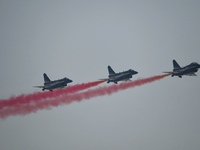 The ''August 1'' aerobatic team of the Chinese Air Force flies a J-10C during a demonstration at the 2024 Zhuhai Air Show in Zhuhai, China,...