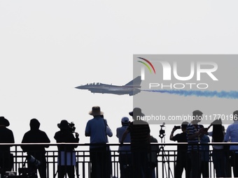 The ''August 1'' aerobatic team of the Chinese Air Force flies a J-10C during a demonstration at the 2024 Zhuhai Air Show in Zhuhai, China,...