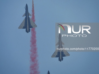 The ''August 1'' aerobatic team of the Chinese Air Force flies a J-10C during a demonstration at the 2024 Zhuhai Air Show in Zhuhai, China,...