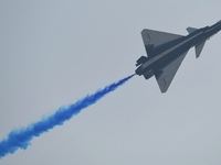 The ''August 1'' aerobatic team of the Chinese Air Force flies a J-10C during a demonstration at the 2024 Zhuhai Air Show in Zhuhai, China,...