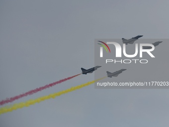 The ''August 1'' aerobatic team of the Chinese Air Force flies a J-10C during a demonstration at the 2024 Zhuhai Air Show in Zhuhai, China,...