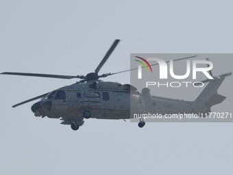 A Chinese Navy ship-borne helicopter Z-20 performs a flight demonstration at the Zhuhai Air Show in Zhuhai, Guangdong province, China, on No...