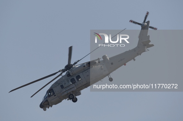 A Chinese Navy ship-borne helicopter Z-20 performs a flight demonstration at the Zhuhai Air Show in Zhuhai, Guangdong province, China, on No...