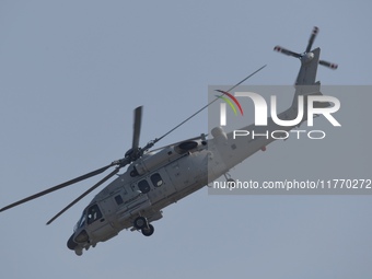 A Chinese Navy ship-borne helicopter Z-20 performs a flight demonstration at the Zhuhai Air Show in Zhuhai, Guangdong province, China, on No...