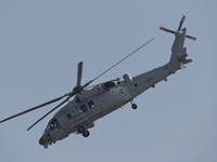 A Chinese Navy ship-borne helicopter Z-20 performs a flight demonstration at the Zhuhai Air Show in Zhuhai, Guangdong province, China, on No...