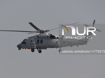 A Chinese Navy ship-borne helicopter Z-20 performs a flight demonstration at the Zhuhai Air Show in Zhuhai, Guangdong province, China, on No...