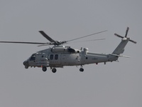 A Chinese Navy ship-borne helicopter Z-20 performs a flight demonstration at the Zhuhai Air Show in Zhuhai, Guangdong province, China, on No...