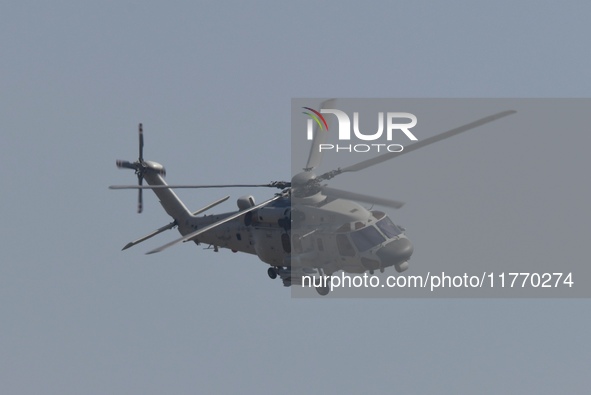 A Chinese Navy ship-borne helicopter Z-20 performs a flight demonstration at the Zhuhai Air Show in Zhuhai, Guangdong province, China, on No...