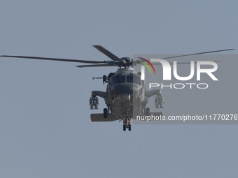 A Chinese Navy ship-borne helicopter Z-20 performs a flight demonstration at the Zhuhai Air Show in Zhuhai, Guangdong province, China, on No...