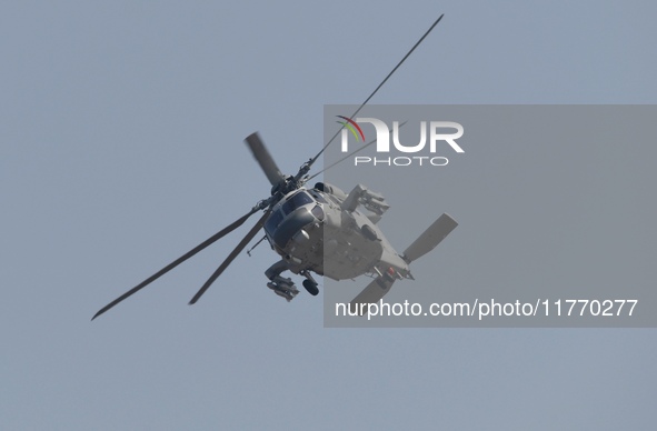 A Chinese Navy ship-borne helicopter Z-20 performs a flight demonstration at the Zhuhai Air Show in Zhuhai, Guangdong province, China, on No...