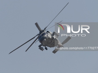 A Chinese Navy ship-borne helicopter Z-20 performs a flight demonstration at the Zhuhai Air Show in Zhuhai, Guangdong province, China, on No...